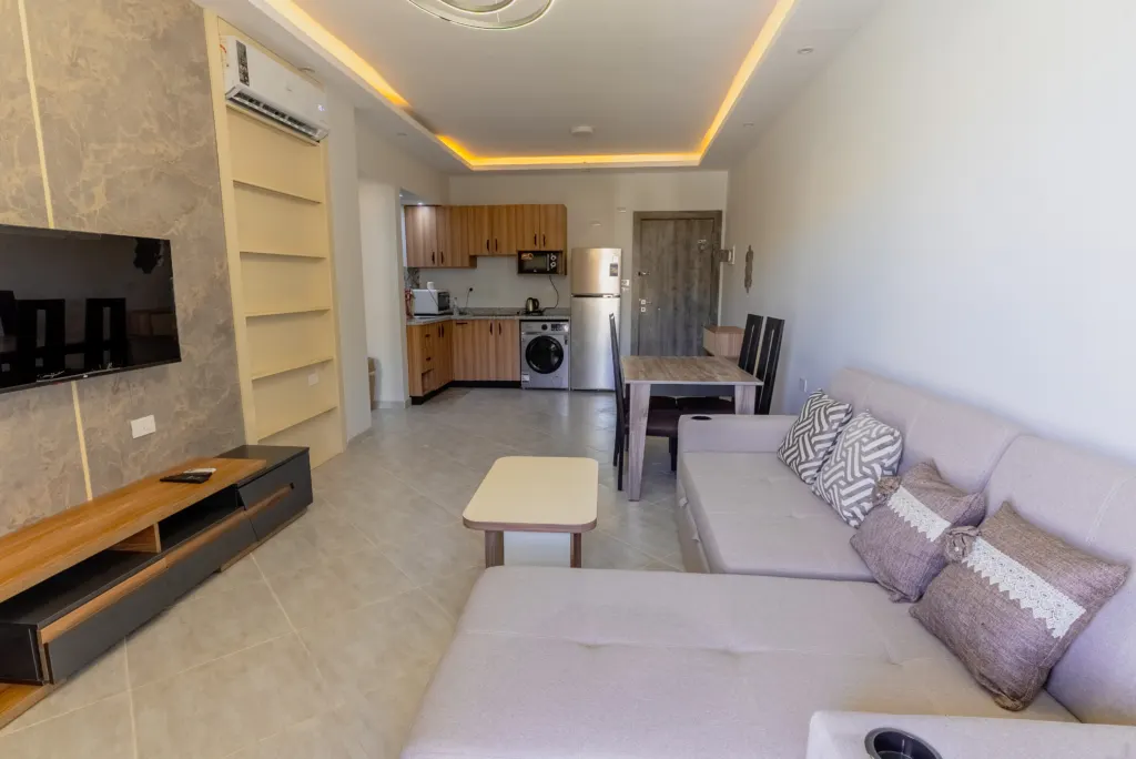 One-bedroom apartment at Panorama View, Sahl Hasheesh – living room and open kitchen